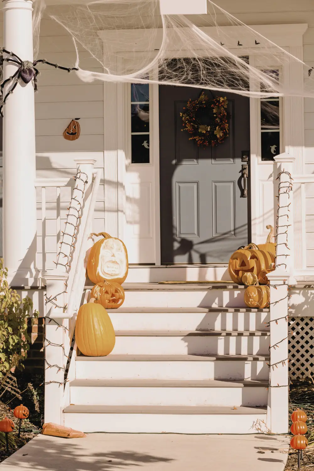 white halloween front door decor